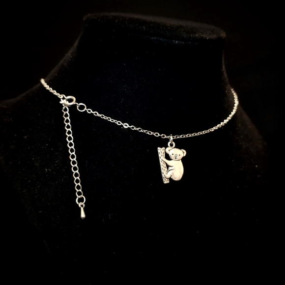 unbranded Jewelry - koala bear necklace 3/8" stainless steel pendant on a silvertone necklace chain